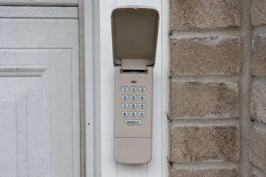 An outdoor keypad beside a garage in New York, NY