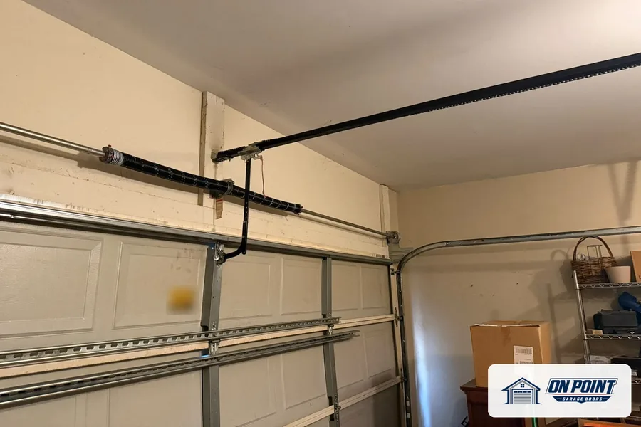 Opener rail and door track inside an attached garage