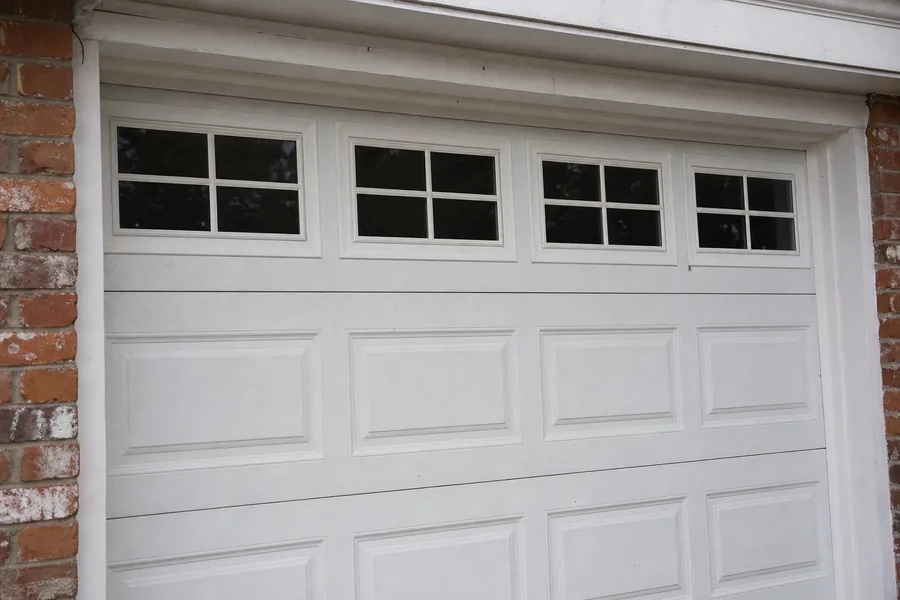 Window panel across the top of a garage door in New York, NY