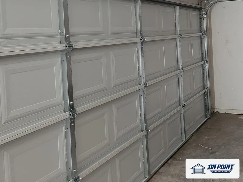 New door, tracks and hinges, photo from one of our jobs